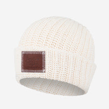 Load image into Gallery viewer, This white speckled beanie features a red maple leather patch debossed with the Love Your Melon logo on the front. These beanies are very cozy and warm and have a slouchier fit. Details: Yarn Color: Natural & White Sizing: 9” x 11” standard when uncuffed. One Size. Content: 99% Cotton 1% LYCRA® Care: Machine wash cold. Use mild detergent. Tumble dry on high.