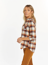 Load image into Gallery viewer, Cool and classic, this button-front top is featured in a relaxed fit with a flattering shirt tail hem and front pocket detailing. Collared neckline Front button closure Shirt tail hem Measurements for a size small: Length: 27 1/4" Chest: 20" Sleeve Length: 24.5" Fabric Content/Care: 100% Cotton Machine Wash Cold Import
