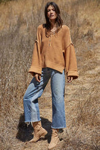 Load image into Gallery viewer, This super cozy and trendy By Together Henley Knit Sweater for Women in Camel is the perfect fall sweater! With a slouchy relaxed fit, Henley neckline, and waffle knit, this neutral-colored sweater pairs well with the rest of your closet. Complete the look with your favorite denim and lug booties!  Color: Camel 100% Cotton Waffle knit Henley button neckline, long wide sleeves Ribbed hemline, cuffed sleeves with button Exposed seams Relaxed, boxy fit Hand wash cold, hang dry
