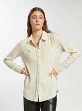 Load image into Gallery viewer, The Lewis Top is effortlessly cool and super soft and comfy. Perfect for a cool casual look with its relaxed fit. Featuring button front closure and front pockets. Wear it buttoned up or layered over your favorite tee.  Collared neckline Button front closure Shirt tail hem Dual front pockets Measurements for a size small:  Length: 27 3/4&quot; Chest: 19.5&quot; Sleeve Length: 24.5&quot; Fabric Content/Care:   62% Polyester 33% Viscose 5% Elastane Machine Wash Cold
