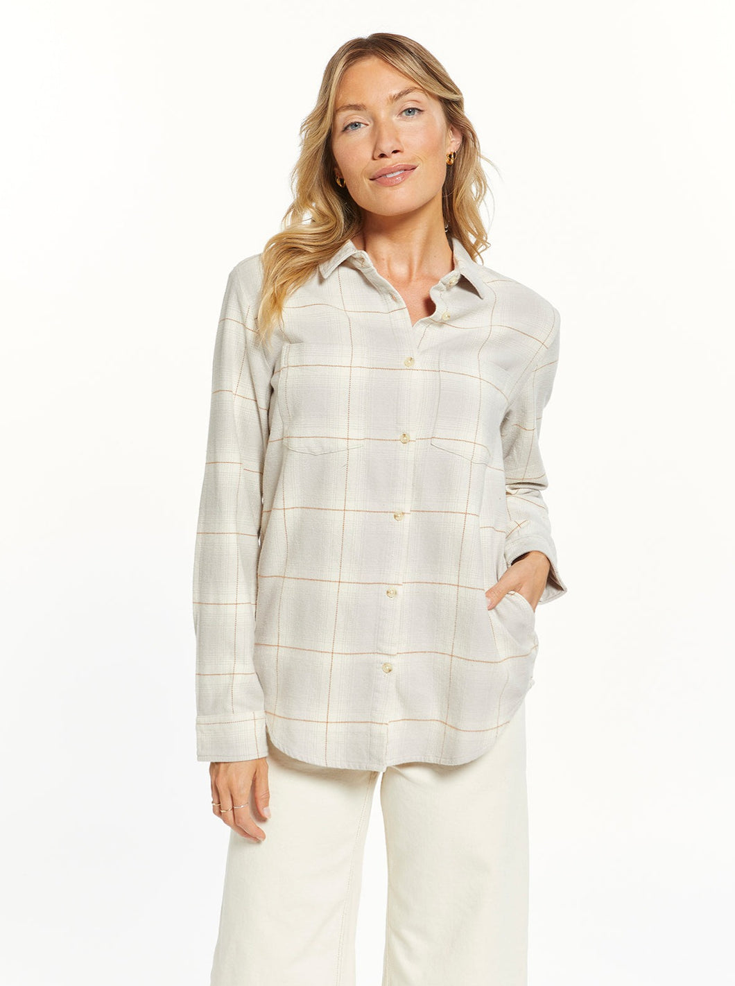 This super cozy flannel can be worn buttoned up or open as a layer. Featuring button front closure, shirt tail hem and yes, pockets!  Collared neckline Button front closure 100% Cotton Machine Wash Cold