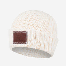 Load image into Gallery viewer, This white speckled beanie features a red maple leather patch debossed with the Love Your Melon logo on the front. These beanies are very cozy and warm and have a slouchier fit.  Details:  Yarn Color: Natural &amp; White  Sizing: 9” x 11” standard when uncuffed. One Size.  Content: 99% Cotton 1% LYCRA®  Care: Machine wash cold. Use mild detergent. Tumble dry on high.
