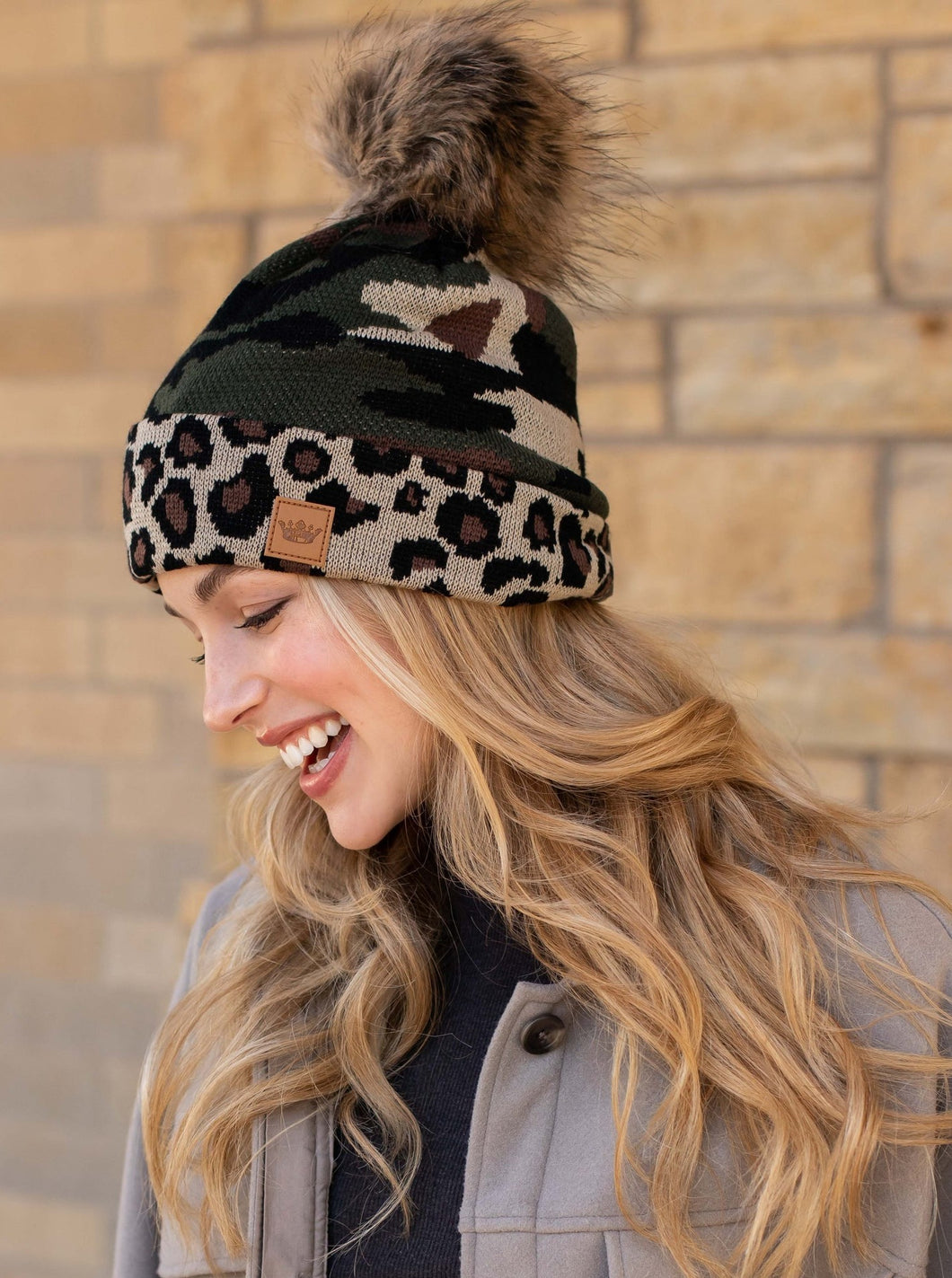 Camo print knit hat  Leopard print trim   Natural faux fur pom accent