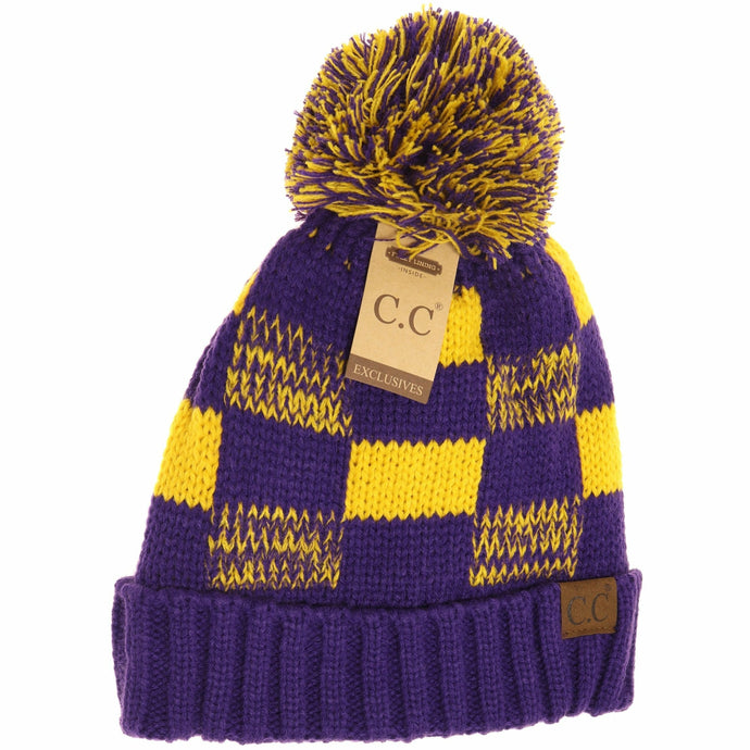 Stay super warm in this buffalo check print beanie with a pom! The inside is lined with a fuzzy fabric to keep your head and ears nice and warm!  HAND WASH ONLY. Lay flat or hang to dry.   100% acrylic