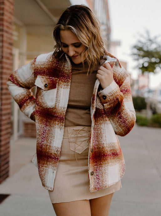 Our Thread & Supply Chandler Shacket in Burgundy Rust Plaid has a full button down front with front and side pockets. Features a shaggy soft feel and relaxed fit. A perfect cozy layering piece. 100% Polyester