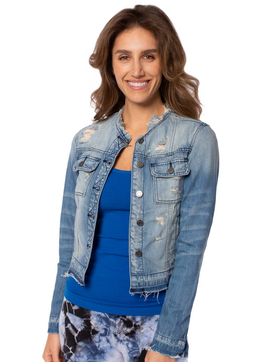 Collarless jean jacket 73% polyester, 27% rayon. Machine wash cold, tumble dry low. The model is 5 feet 9 inches tall, 135 lbs, and is wearing a size small.