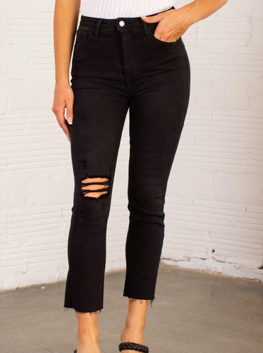 These slim straight black jeans from Just Black offer up an edgy, cool, and casual vibe that is perfect for the fall & winter. Simple sleek, we love how they pull together any look and even with the distressed knee slit add a slightly dressier and elevated look to your outfit.  93% Cotton, 5% Polyester, 2% Spandex   Machine wash cold, Do not bleach, Tumble dry low, Dry cleaning possible 