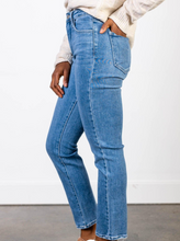 Load image into Gallery viewer, Slim straight denim is the new trending silhouette for the season. A little more polished and pulled together, this slimmer fitting look creates a totally timeless appeal that can be worn season after season.  93% Cotton, 5% Polyester, 2% Spandex
