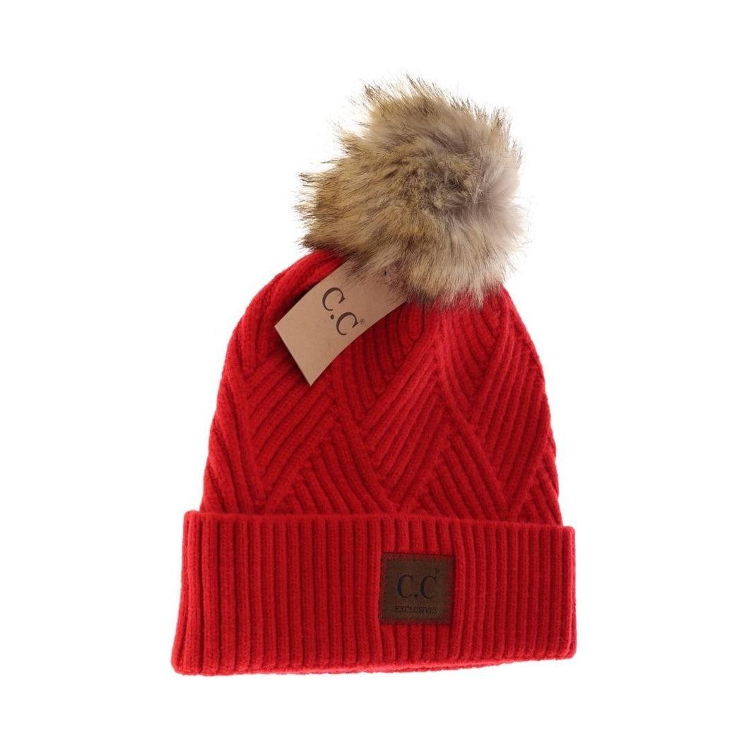 Red diagonal knit pom beanie HAND WASH ONLY. Lay flat or hang to dry.   100% acrylic