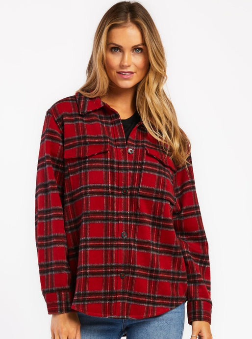 The Stanton Jacket is the perfect piece for your fall wardrobe. This plaid shacket features long sleeves, button front, and flap chest pockets. It's versatile enough to be worn as a standalone piece or layered over a shirt or sweater. The Stanton Jacket is sure to keep you warm and stylish all season long. 90% Poly and 10% Wool Machine wash cold, tumble dry low Color: Red Black Plaid Model is 5'9