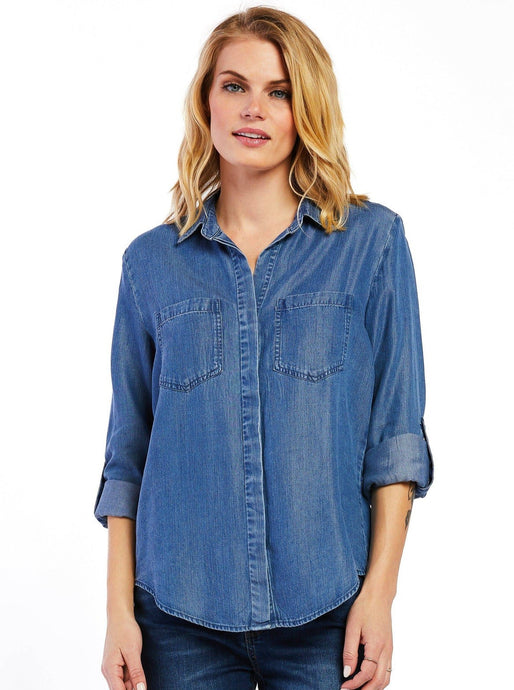 The Riley collared button down shirt features rolled tab sleeves, double chest pockets, a split back tail, and a frayed hem. This shirt is a perfect staple to any wardrobe.   100% Eco Friendly Tencel™ Machine wash cold Color: Calva Model is 5'9